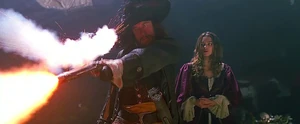 Captain Barbossa firing his pistol.