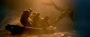 The mermaids attack the crewmen.