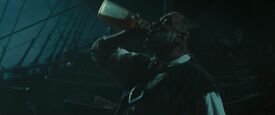 Joshamee Gibbs drinking rum.