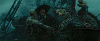 Barbossa fighting the  
