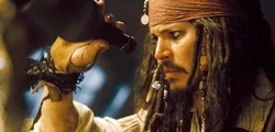Jack Sparrow with an empty bottle of rum.