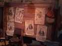 The wanted posters of Hector Barbossa, Jack Sparrow, Blackbeard, and Davy Jones at Treasure Cove.