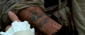 Jack's signature tatoo and branded "P"