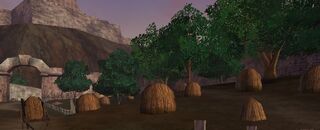 Hay bales on the side of the grounds.