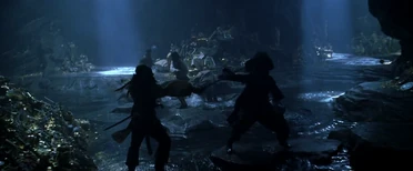 La battaglia nella grotta dell'isola.