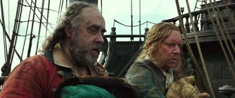 Mullroy e Murtogg si levano il cappello dopo aver appreso la morte del loro capitano.