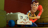 Chatter Telephone helps Woody by giving him an escape route of Sunnyside.