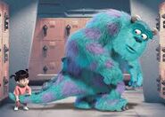 Boo holding Sulley's tail