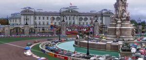 The racers speeding in front of Buckingham Palace.