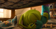 Little Mikey next to Sulley's arm