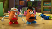 Mr. and Mrs. Potato Head and Aliens In Toy Form