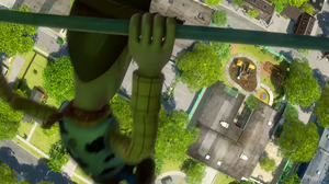 Woody dangling from a hang glider right over .