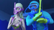 Ken and Barbie react to seeing a shark on TV screen