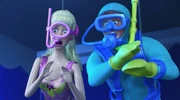 Barbie and Ken react to seeing a shark on TV screen