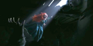 Queen Elinor, as a bear, reaching to save Merida from Mor'du.