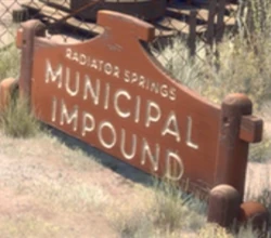 The sign for Radiator Springs Municipal Impound