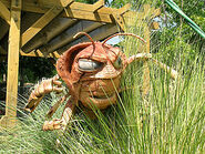 A statue of Hopper outside the "Bug's Life Theater"