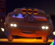 Snot Rod beside Mack talking to the other tuners