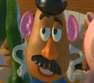 Mr. Potato Head smirking.