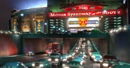 Cars exiting the speedway after the Dinoco 400