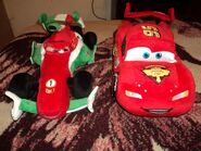 Francesco Bernoulli and McQueen's big plushies from Disney Store.