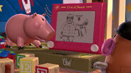 Etch helping the toys during the crime scene in Toy Story 2.