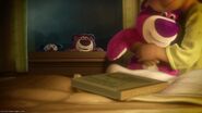 Daisy hugging a replacement Lotso doll