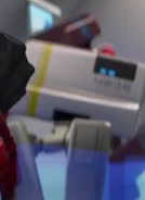 The Reject D-FIB lookalike with the Maroon and Navy Blue Robot partially seen behind him