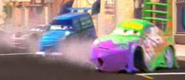 DJ drifting in Radiator Springs with Wingo and Boost