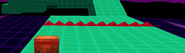 A red spike strip, which has 10 spikes on it.