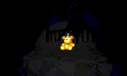 Quarto teaser da atualização de Halloween clareado. Note Nightmarionne atrás da pelúcia de Freddy.