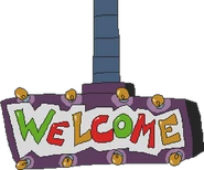 The sign near the entrance of the Pizza Tower welcoming the player.