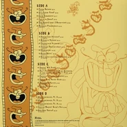 Noise stands with his wicked smile. It is a list of all the tracks on the vinyl record, meanwhile on the same cover, Noisette can be seen dancing holding an umbrella on the top.