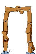 Wasteyard's level gate, an archway made out of haphazardly nailed together planks with some blue sand and a bone.