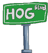 Street sign, that has "Hog blvd" text on it.