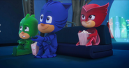 The PJ Masks watching replays of their powers