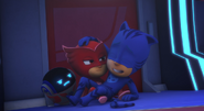 Catboy lands on owlette and pj robot