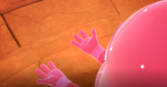 Teeny Weeny looks at his hands as they glow red