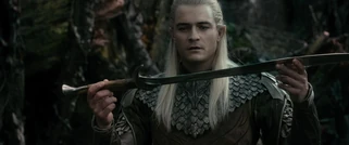 Legolas looks at Orcrist in Mirkwood