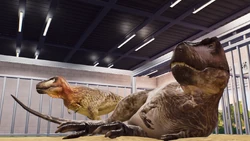 Two pre-update Tarbosaurus inside an indoor enclosure.