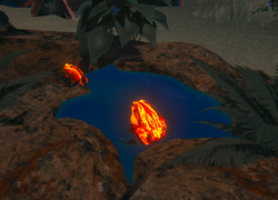 Lavaum frogs at their pond after reaching the Amphibians stage. The player can also drink from these ponds while using a Water Filter.
