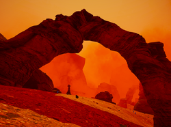 Typical view approaching from the north, in the beginning of the game, with a cairn below the arch.