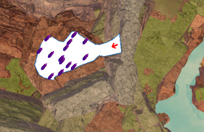 One of the Magnetar Quartz caves is high up on the plateau, at the east end of the canyon. It is separated from the rest of the caves. The red arrow marks the entrance.