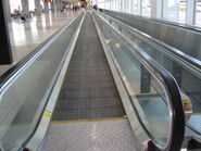 An escalator in the airport.