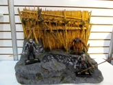 Dawn of the Planet of the Apes figures: Maurice in back on right.