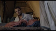 Malcolm watches curiously as Alexander reads with Maurice.