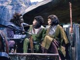 A gorilla stops Lucius and Zira as they escape the city, in a scene that was cut