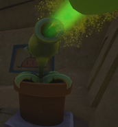 A Pea Cannon shooting pea