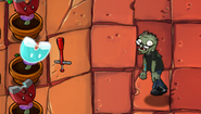 A Pogo Zombie's pogo stick being stolen by the Magnet-shroom