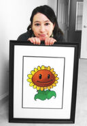 Laura Shigihara with a portrait of Sunflower